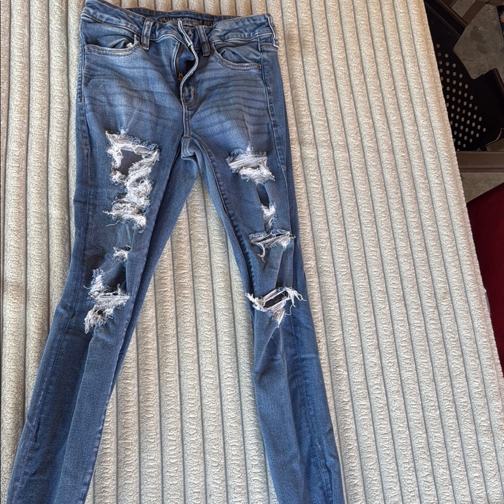 Blue Skinny Distressed Jeans with Ripped Details